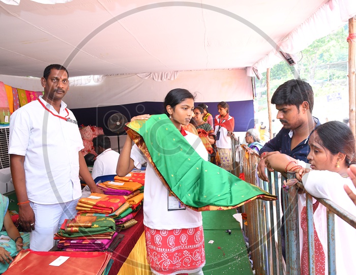 Devotees buying Sarees for Goddess Durga