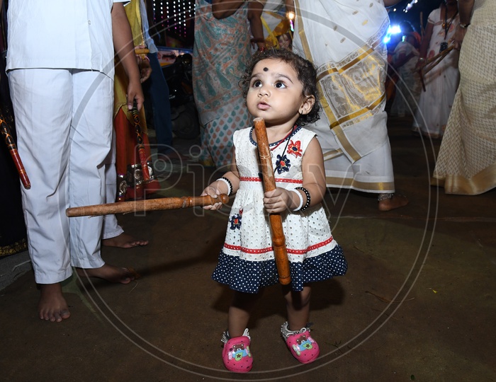 Indian Girl With Dandiya Sticks In Hand