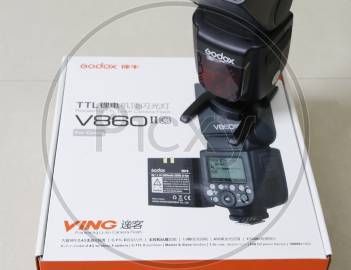 Godox V860 ii For Canon Mount Flash Light  On an Isolated white