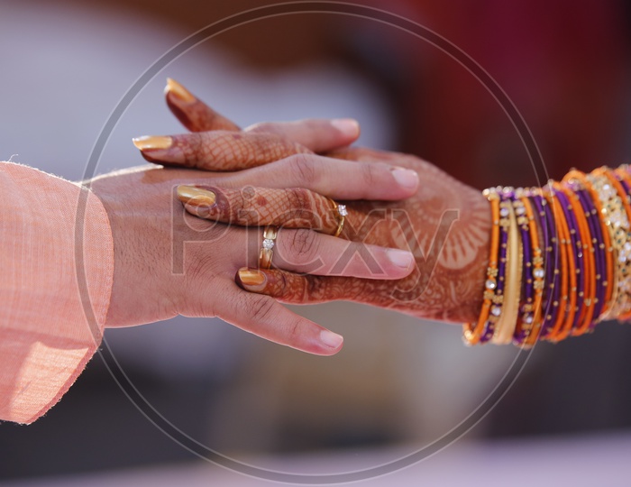 Bride And Groom Hands Closeup in an Engagement Ceremony