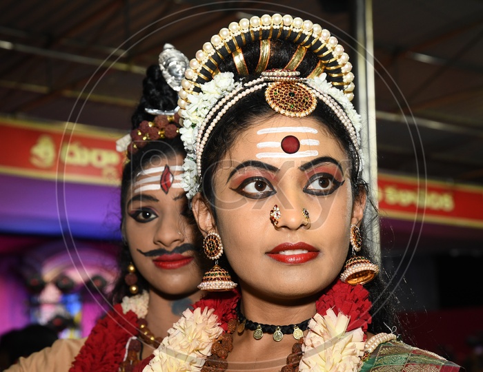 Bharathanatyam  Classical Dancer Performing  With Postures On Stage  During an Cultural Event