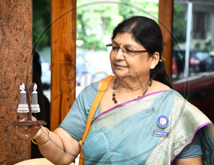 Image of Indian elderly woman wearing saree-CX227279-Picxy