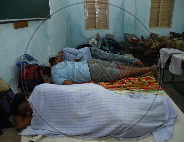 Police Sleeping on School Benches After Duty During Durga Navratri Festival in Vijayawada