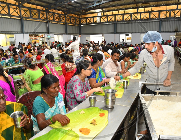 Volunteers Serving Food For Devotees Called As Annadanam Or Free Food Donation Scheme at Temple Devastanams