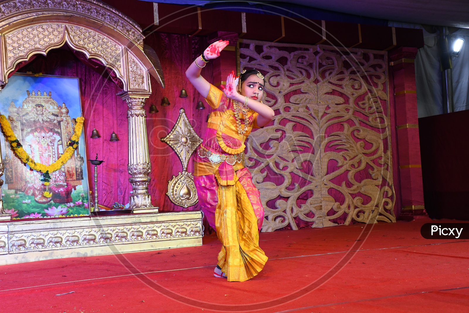 Indian Girl performing a traditional dance  during Dussehra Celebrations