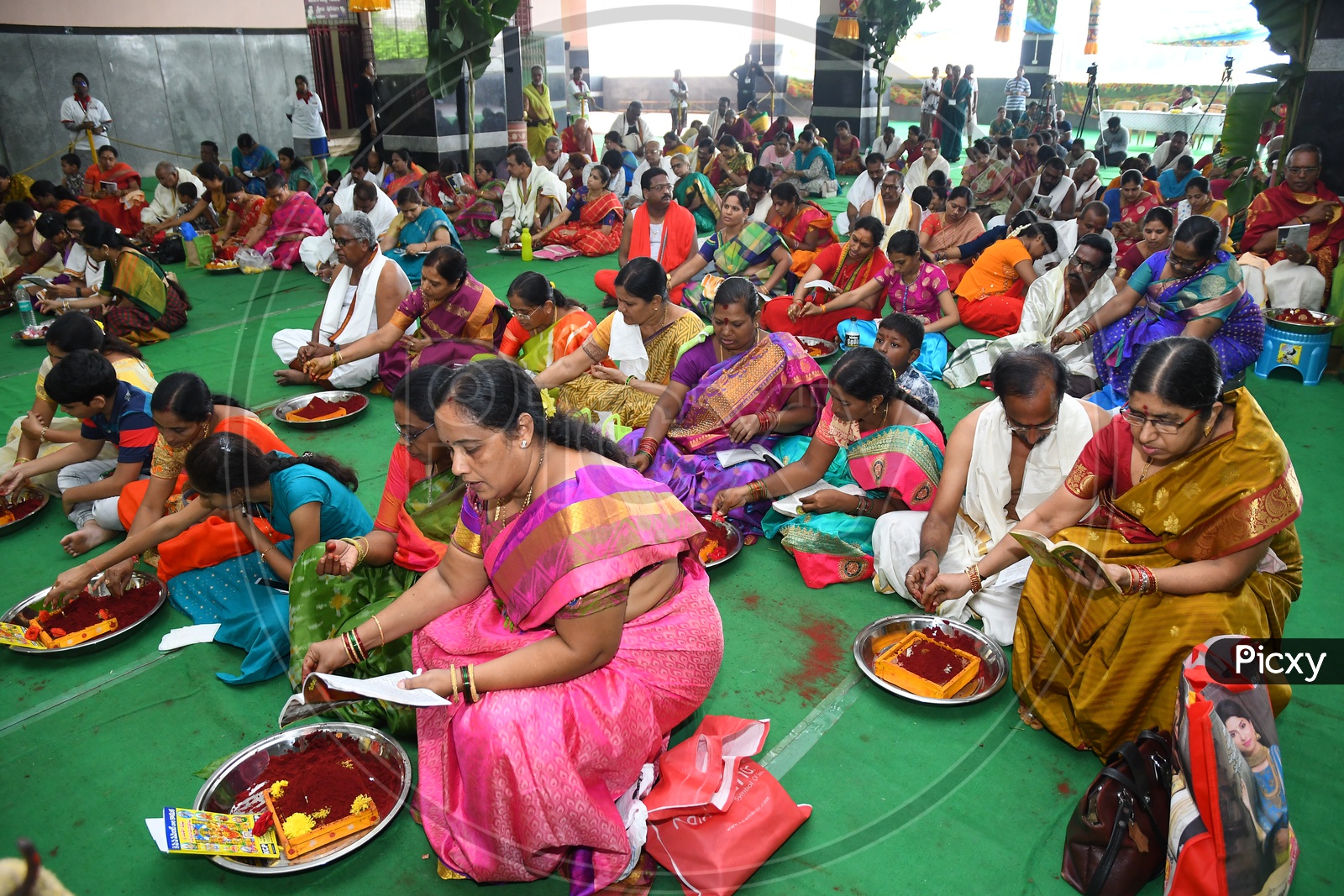 Devotees Performing Kumkum Archana As a Part Of Worship in Kanaka Durga Temple