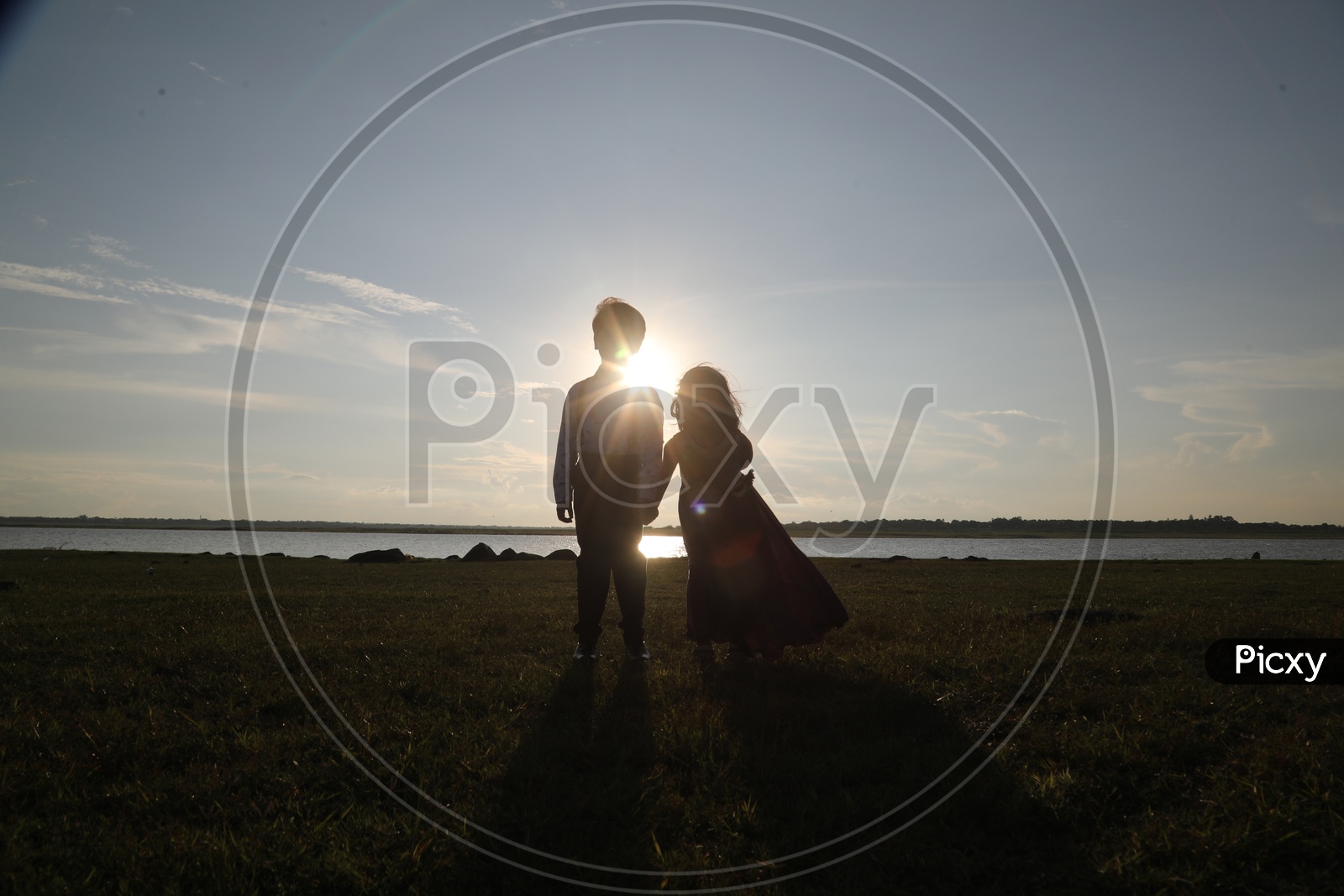 Image of Indian Brother and Sister during a photoshoot-US845469-Picxy