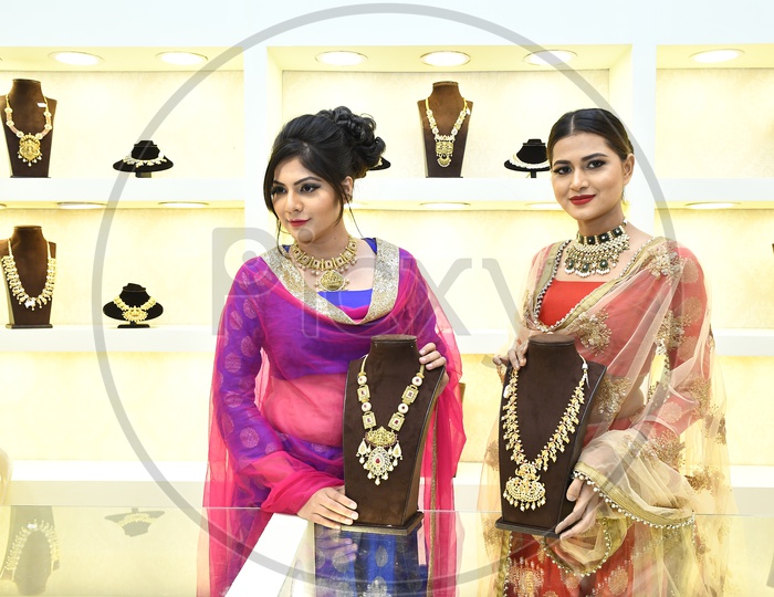 Two Female Models posing with the Jewelry