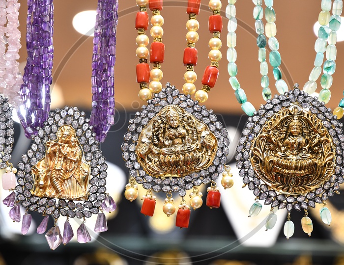 Close up of Hindu God Pendants during Exhibition