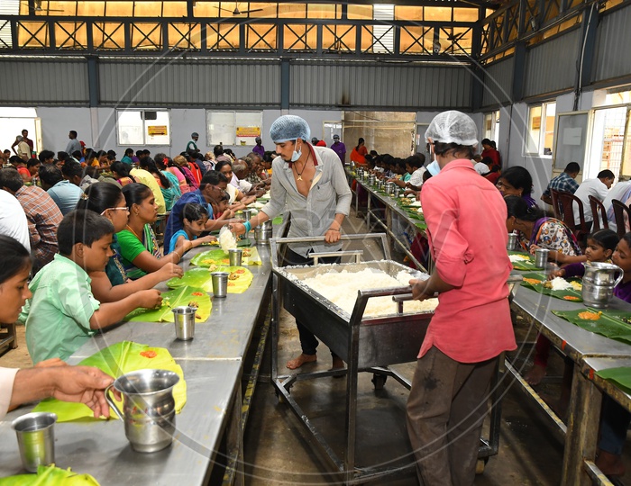Volunteers Serving Food For Devotees Called As Annadanam Or Free Food Donation Scheme at Temple Devastanams