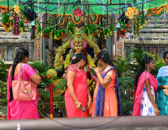 Hindu Devotees Praying at a Temple