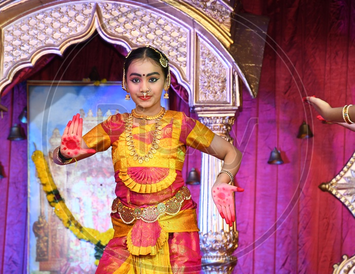 Indian Dancer Girl performing a traditional dance during Dussehra