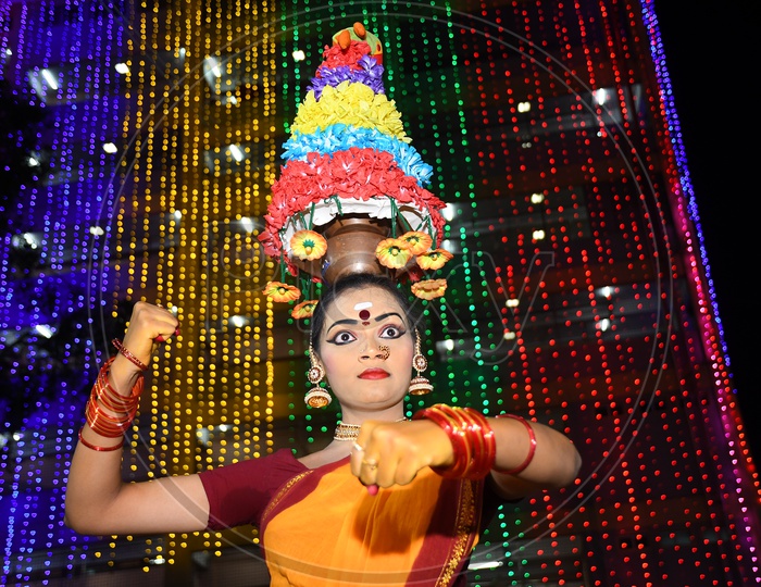 Indian Dancer girl with Garba pot on her head Dussehra Celebrations