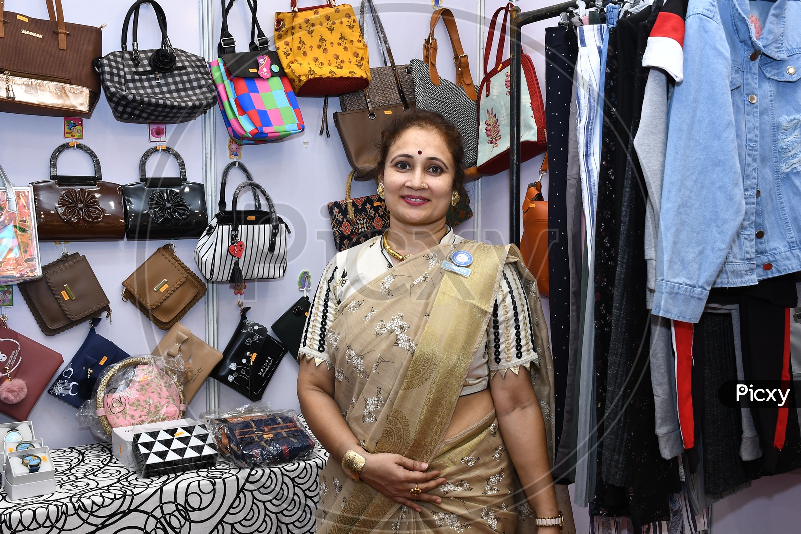A Woman by the Handbag stall in the Exhibition