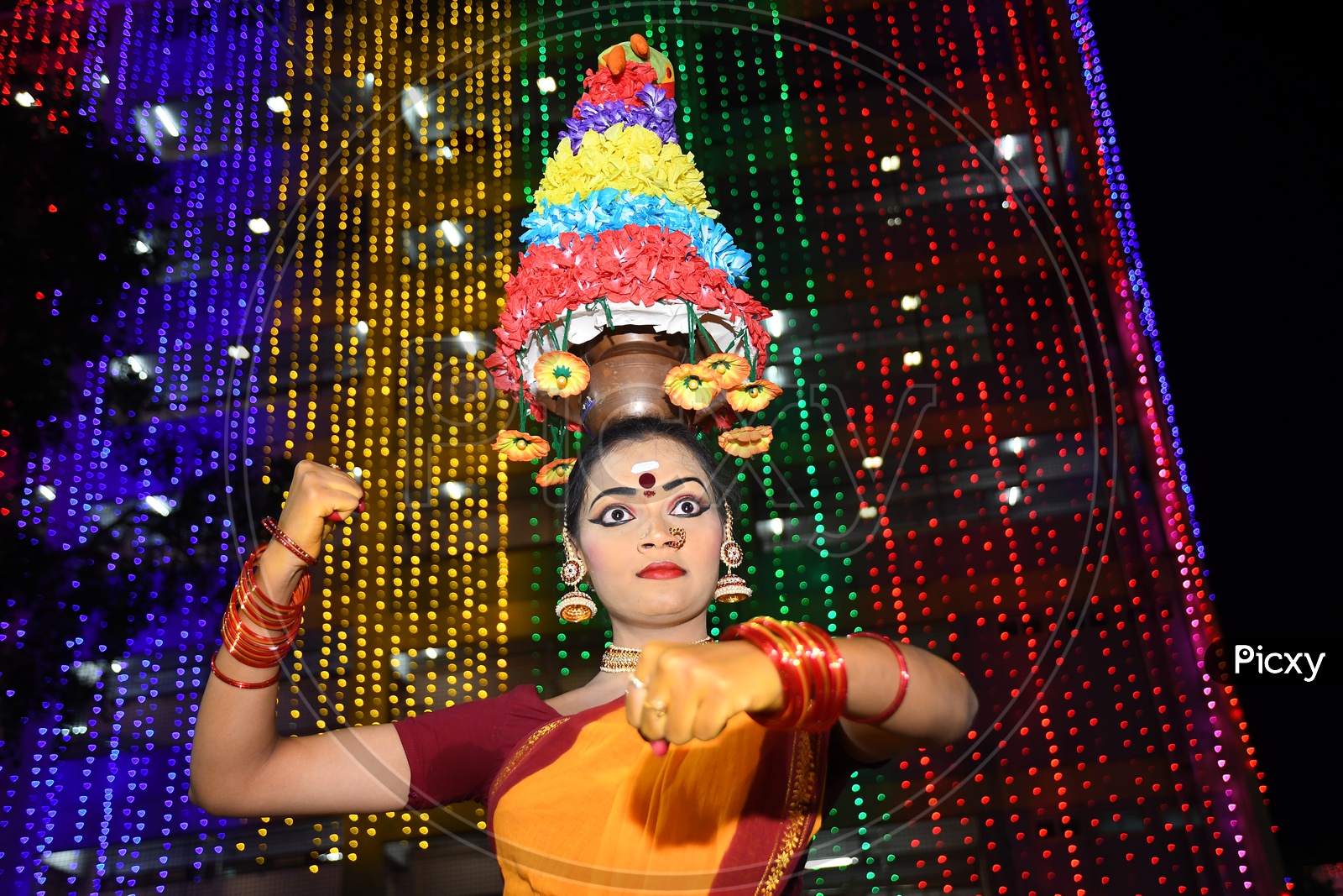Indian Dancer girl with Garba pot on her head Dussehra Celebrations