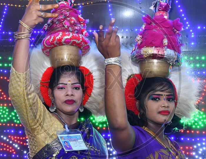 Indian Girls with Garba Pots on their heads during Dussehra Celebrations