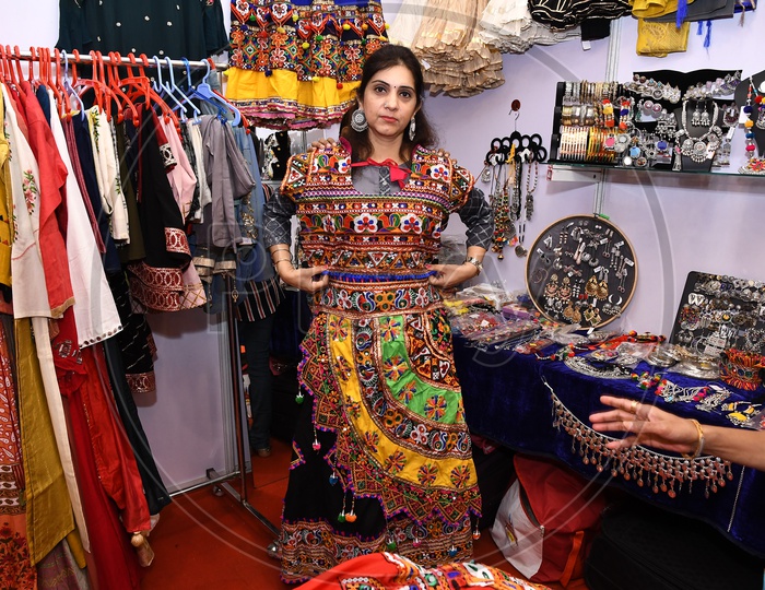 Indian Man Trying Tribal Dress in a Boutique