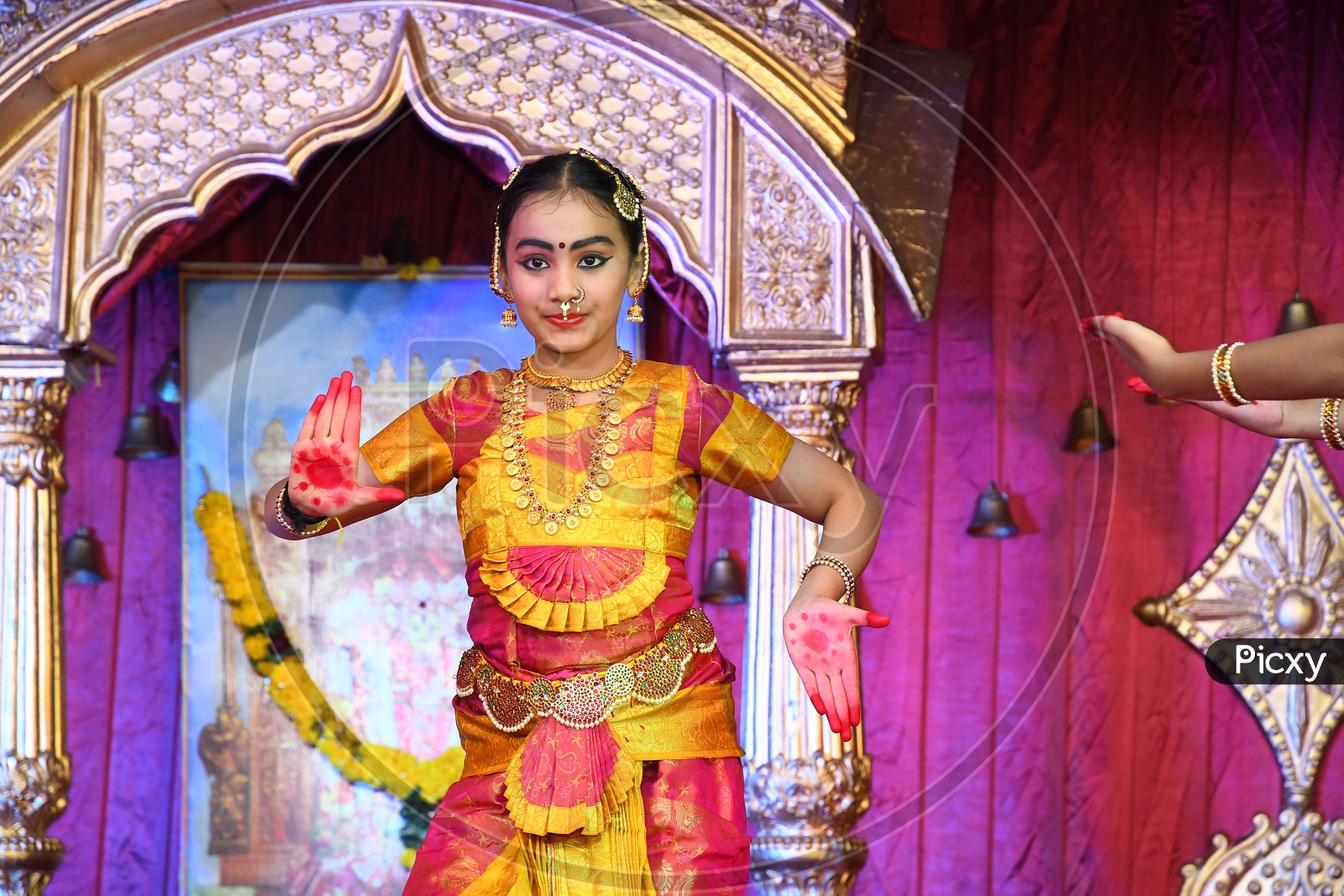 Indian Dancer Girl performing a traditional dance during Dussehra