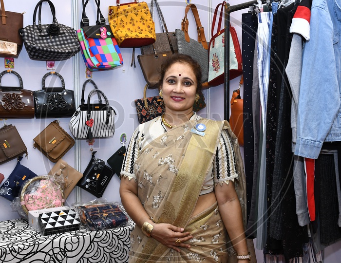 A Woman by the Handbag stall in the Exhibition