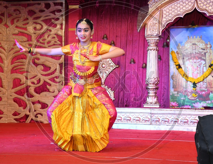 Indian Girl performing Bharatanatyam Dance during Dussehra Celebrations