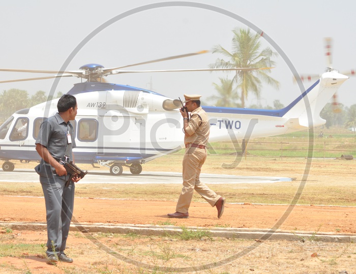 Image Of Indian Police Man Speaking On The Walkie Talkie-NJ228179-Picxy