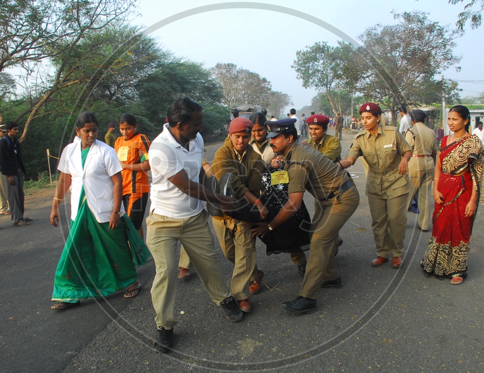 AP Police dragging a woman during protest