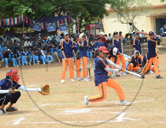 Indian College girls during a Baseball match