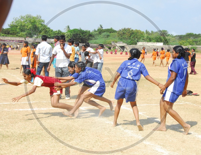 School girls playing kabaddi