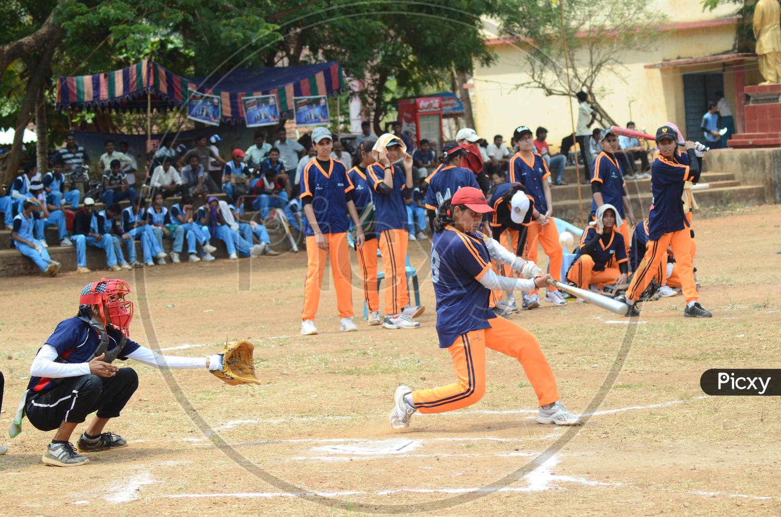 Indian College girls during a Baseball match