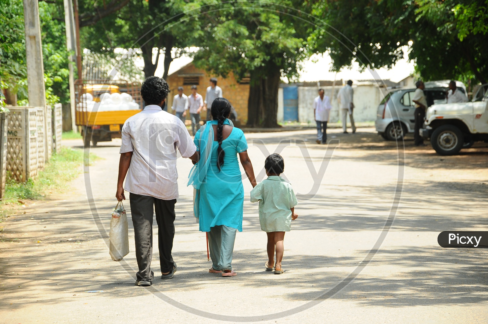 An Indian Family walking on the road