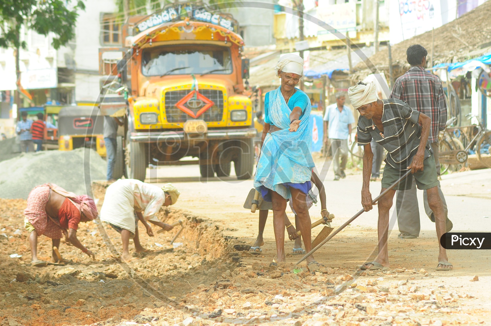 Indian Workers during Road Extension Work in Vijayawada