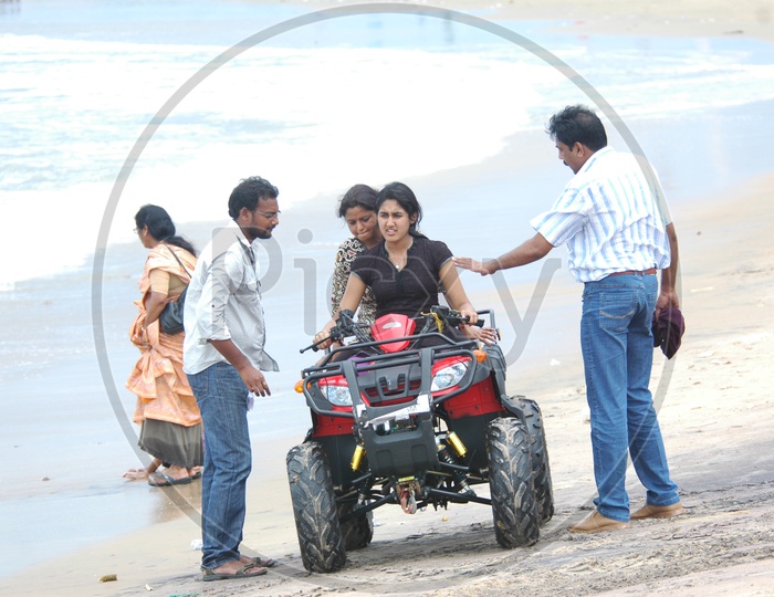 Indian Girls riding Quad Cars by the beach