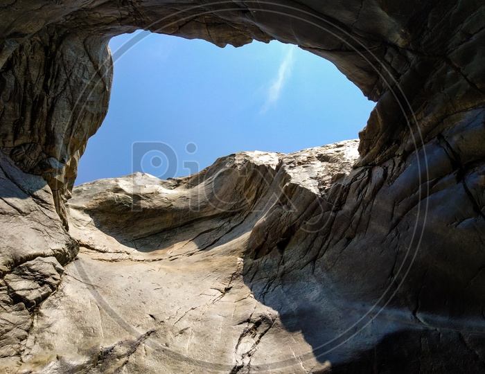 Rock Formations Canopy Over blue Sky