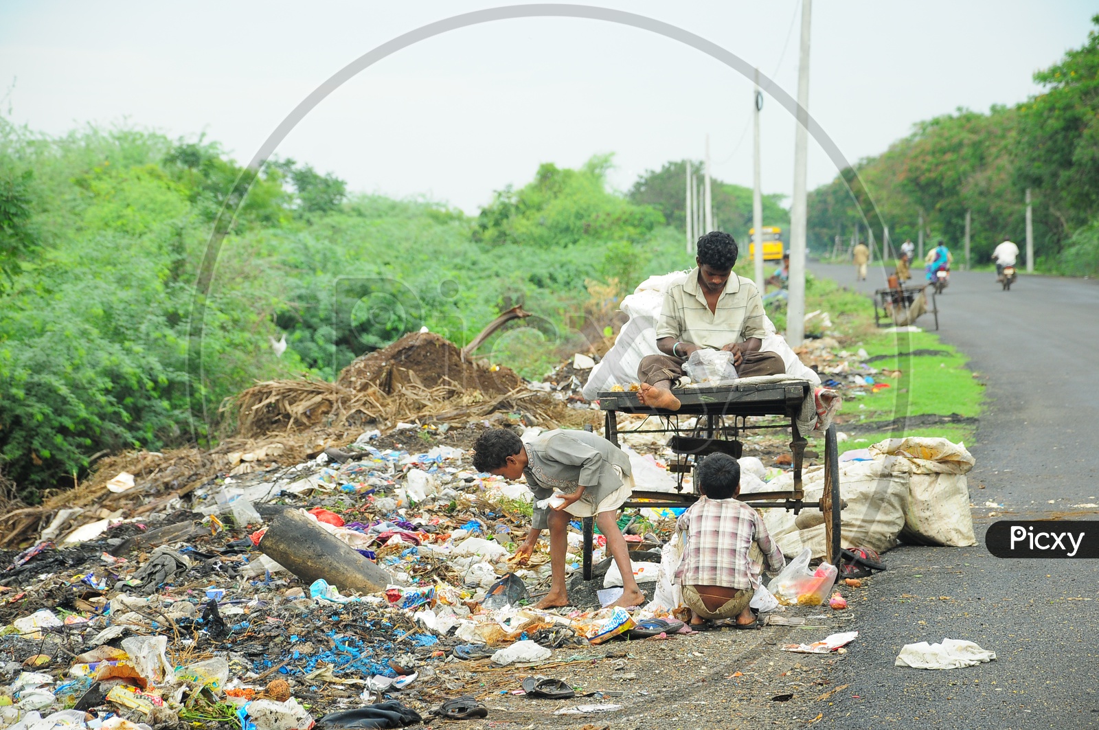 A Rag Pickers Family along side a road