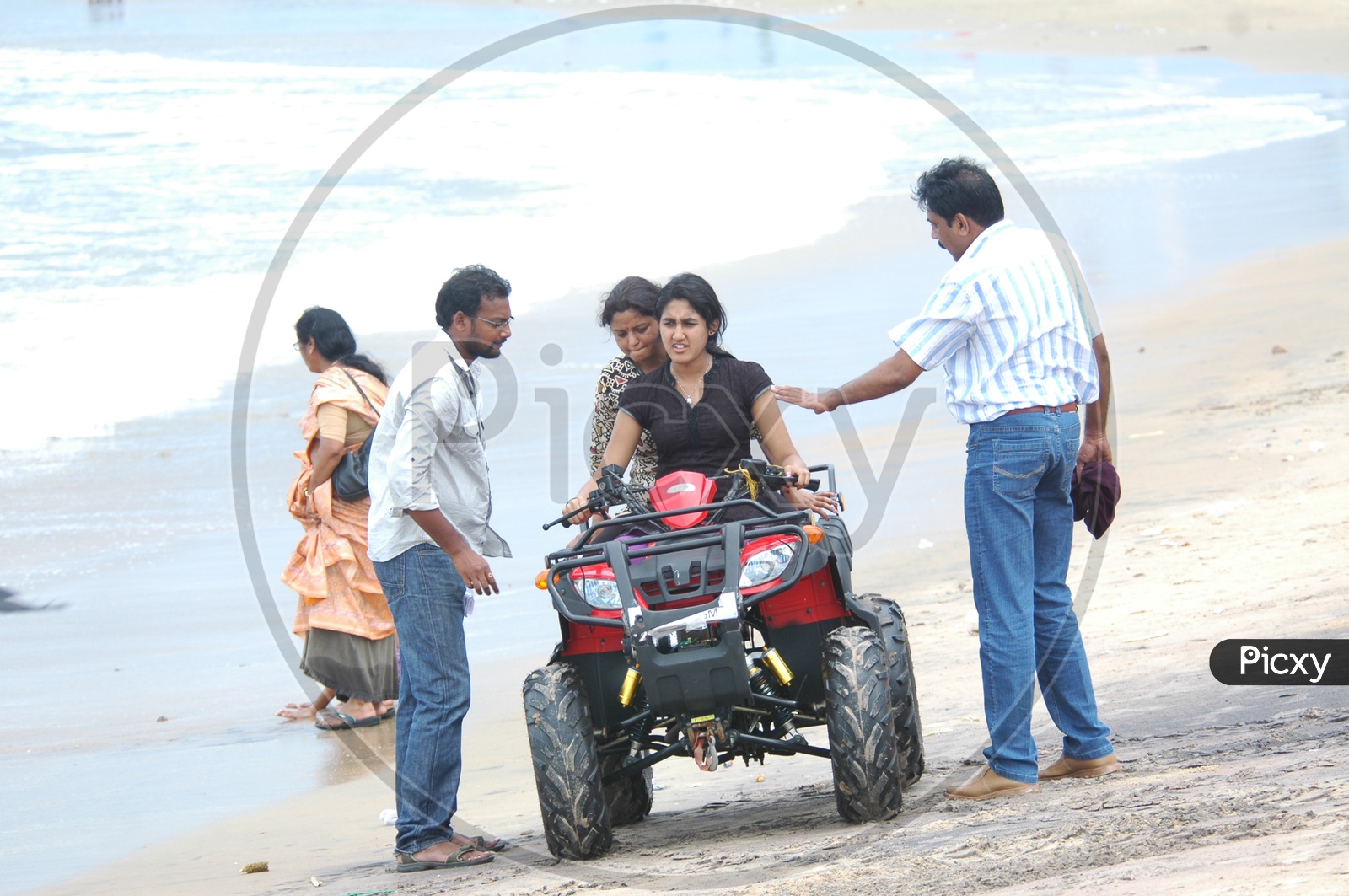 Indian Girls riding Quad Cars by the beach