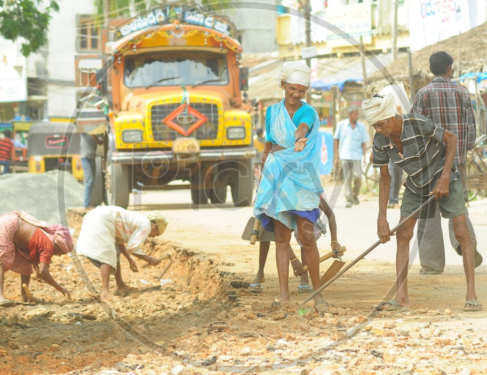 Indian Workers during Road Extension Work in Vijayawada