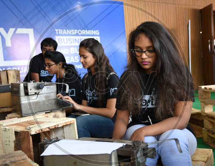 Indian Young Girls Using Type Writer Machines