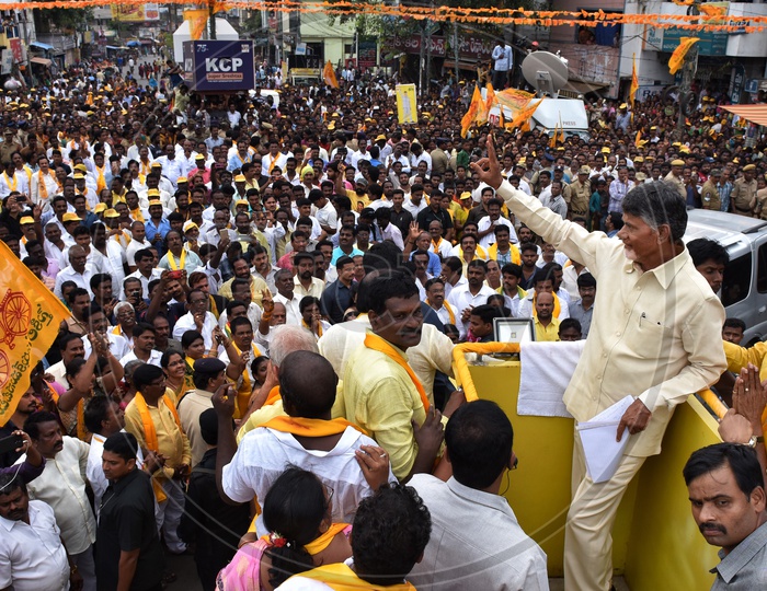 Former Andhra Pradesh Chief Minister Nara Chandrababu Naidu Showing Victory Symbol in Election Campaign