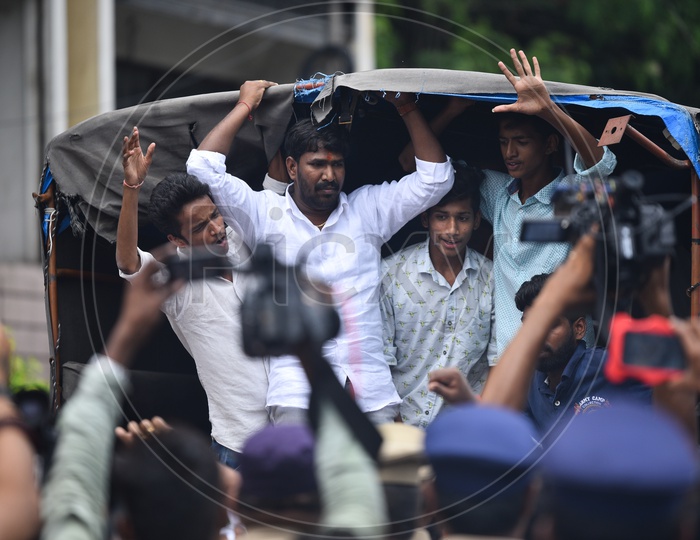 men being detained into a van by Telangana Police as he protests at Pragathi Bhawan Gherao on 21st October,2019