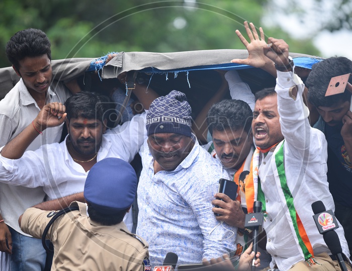 Men chant slogans against CM KCR after getting arrested by Telangana State Police