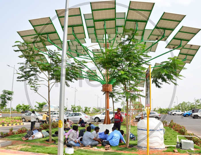 People resting under Solar Panels as Trees in Andhra Pradesh Secretariat