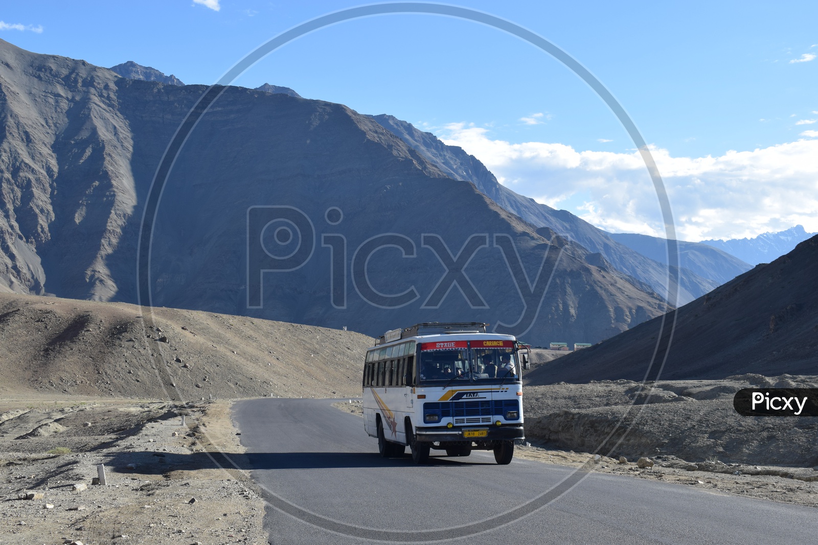 JK transportation Bus passing on highway in ladakh