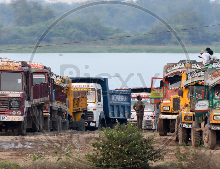 Sand Mining Activities or Dredging  At River Or Lake Bed , Sand Mafia Near AP CM House In Krishna River Bed in Vijayawada