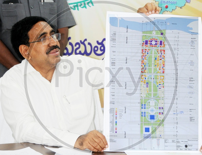 Former AP Municipal Administration Minister P. Narayana with Amaravati Government Complex Plan Displaying to Media