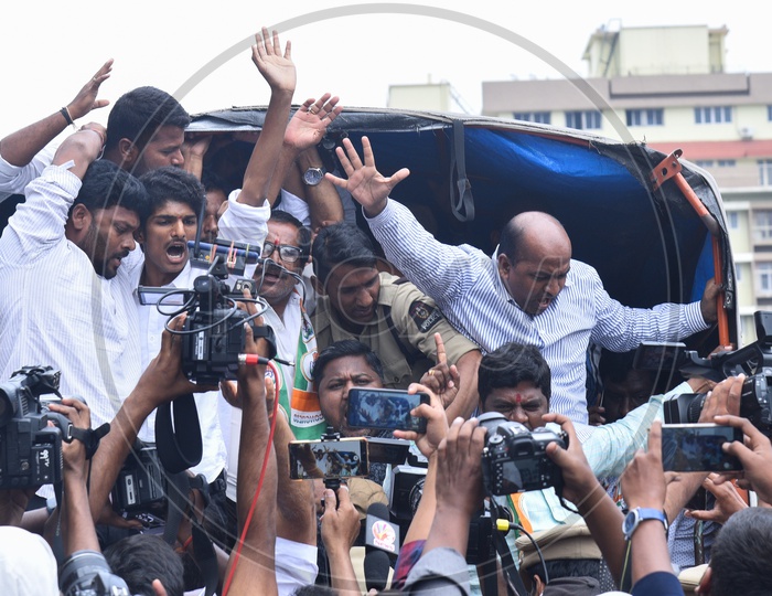 men chant slogans against Telangana Chief Minister, K Chandra Shekhar Rao after being arrested by Police
