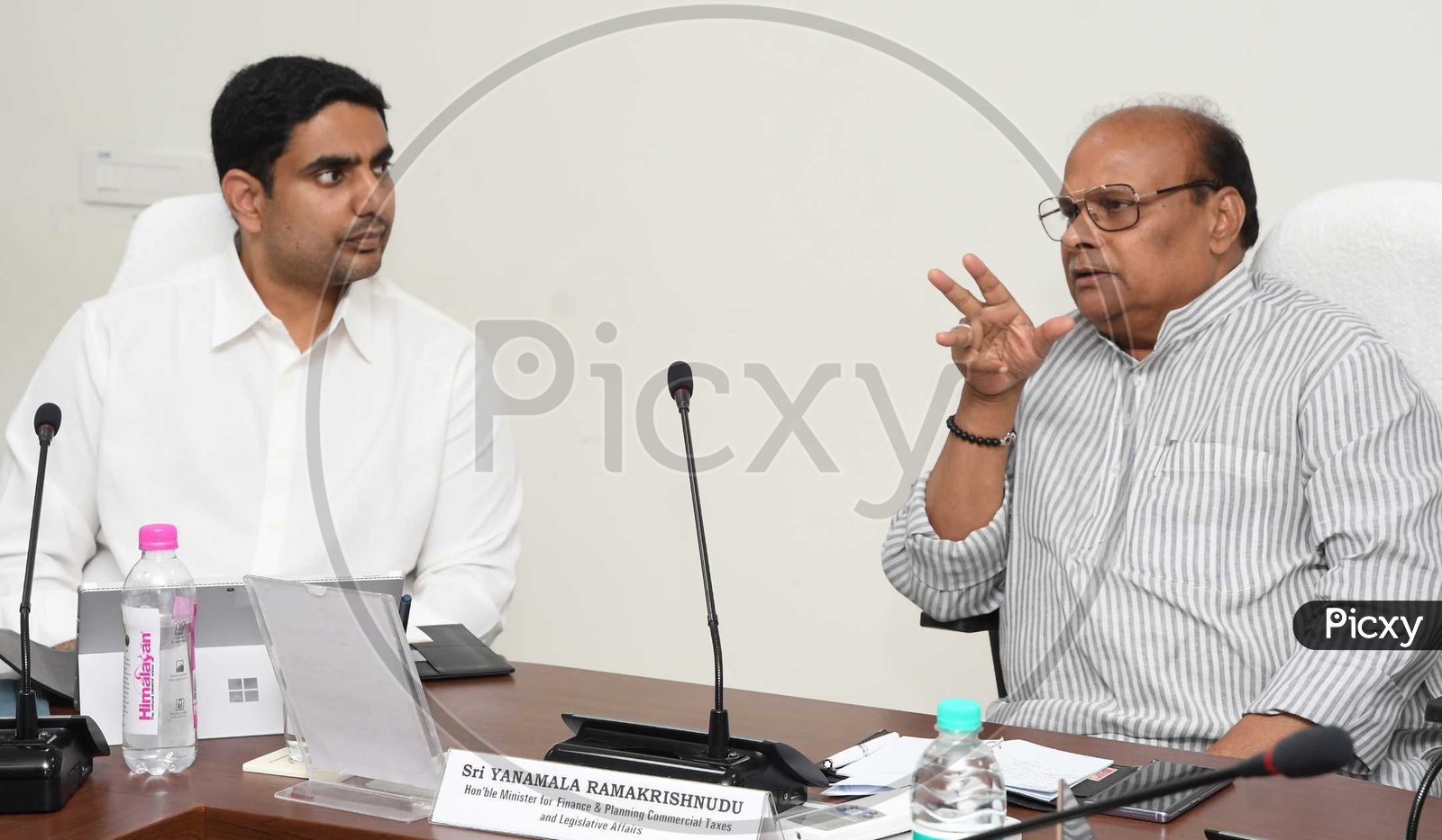 Former IT Minister Nara Lokesh and Yanamala Rama Krishnudu