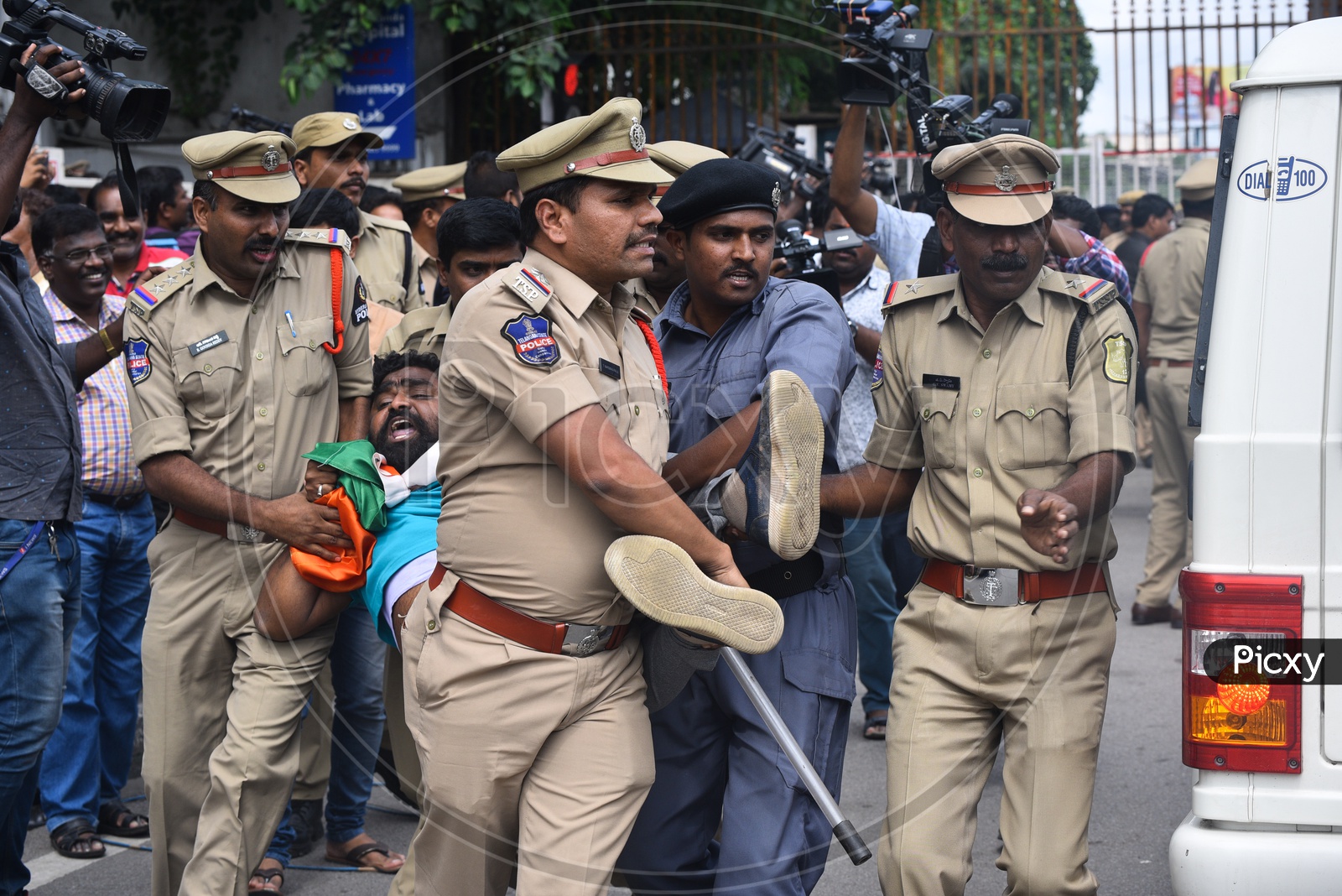 A congress party worker being arrested by the Police as he protests at Pragathi Bhawan after Congress party calls for a Gherao of  CM KCR's residence