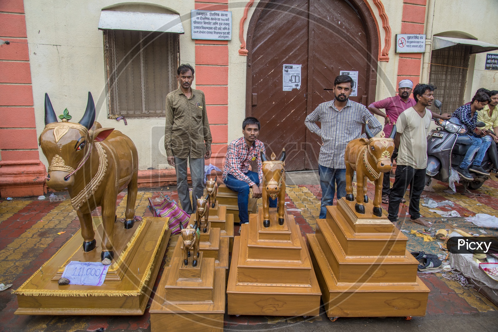 Nagpur People With  children's celebrating the Pola festival by decorating and exhibiting a wooden bull