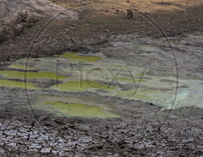 drying River Valley With Cracked Soil Patterns