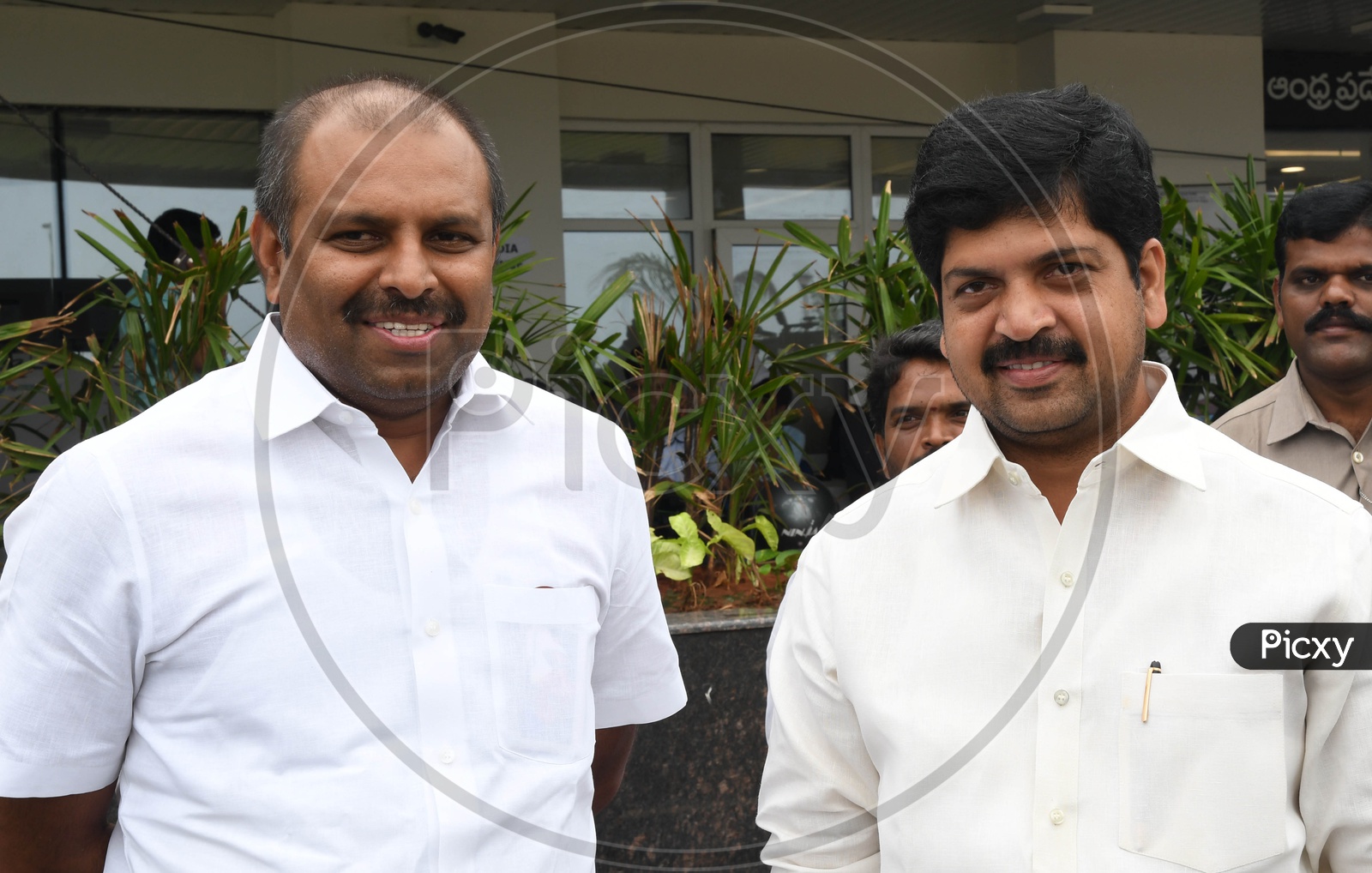 Former Minister Kollu Ravindra and YCP MLA Srikanth Reddy